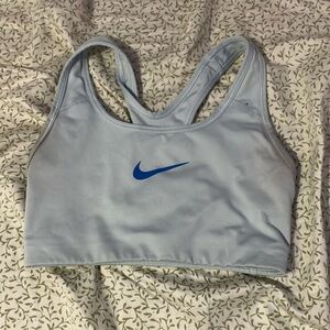 It’s a blue sport bra from Nike there no rips or holes